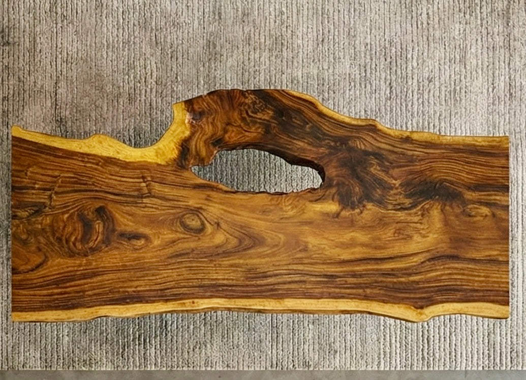 Exotic Live Edge Solid Wood Table with metal legs perfect for home decor.