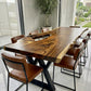Exotic Live Edge Solid Wood Table with metal legs perfect for home decor.