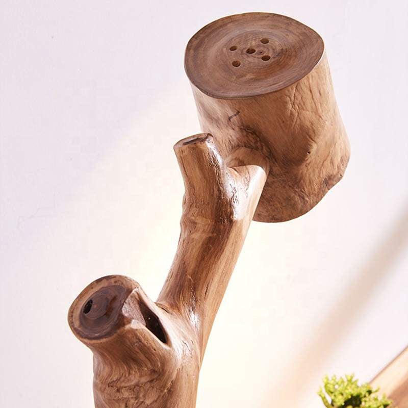 Eco-Friendly Illumination: Handmade Wooden Lamp with Old-World Globe Bulb.