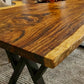 Exotic Live Edge Solid Wood Table with metal legs perfect for home decor.