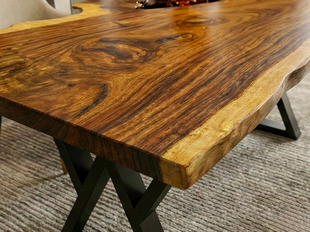 Exotic Live Edge Solid Wood Table with metal legs perfect for home decor.