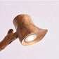 Eco-Friendly Illumination: Handmade Wooden Lamp with Old-World Globe Bulb.