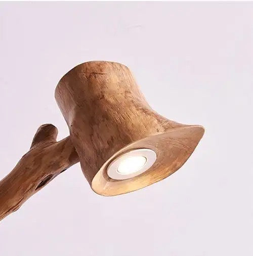 Eco-Friendly Illumination: Handmade Wooden Lamp with Old-World Globe Bulb.