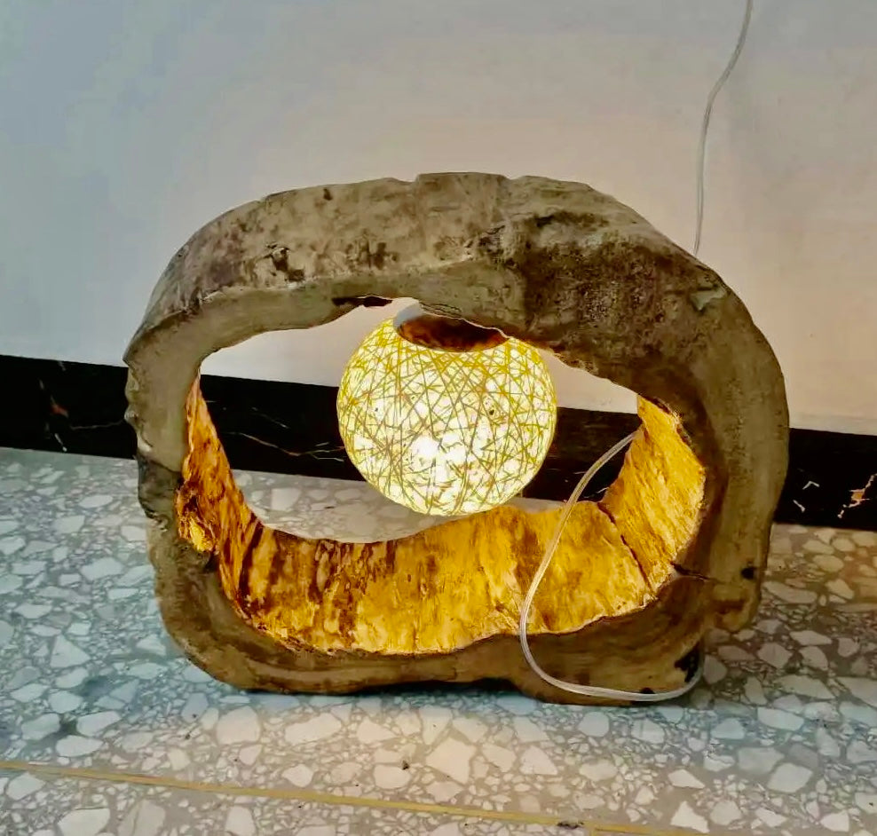 Radiate Warmth and Style: Rustic Camphor Wood Lamp with Flickering Fire Effect LED.