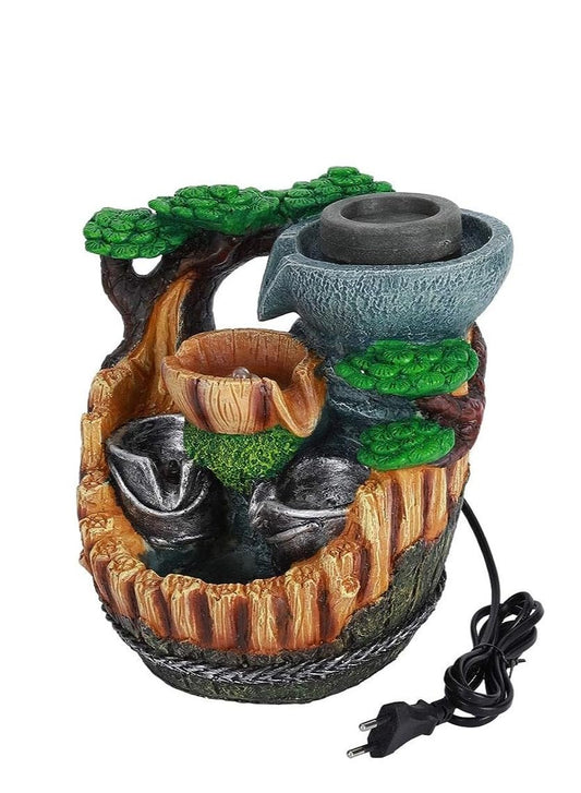 نافورة مياه داخلية على سطح الطاولة مع تصميم صخري.